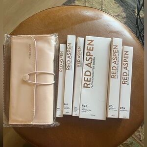 Red Aspen Makeup Brush
Bundle NIB Includes makeup brush roll.